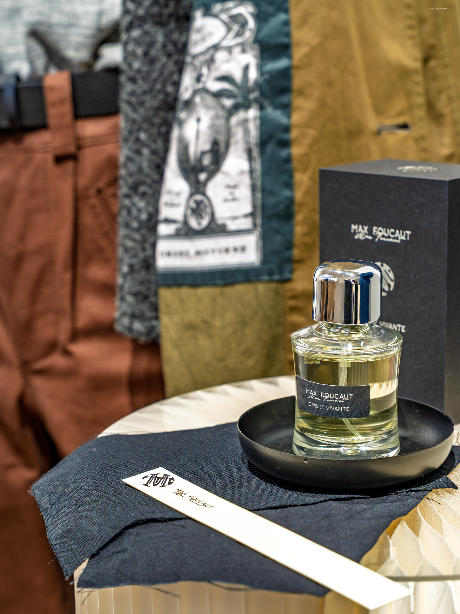 A Max Foucaut eau de parfum displayed with its packaging on the house stand
